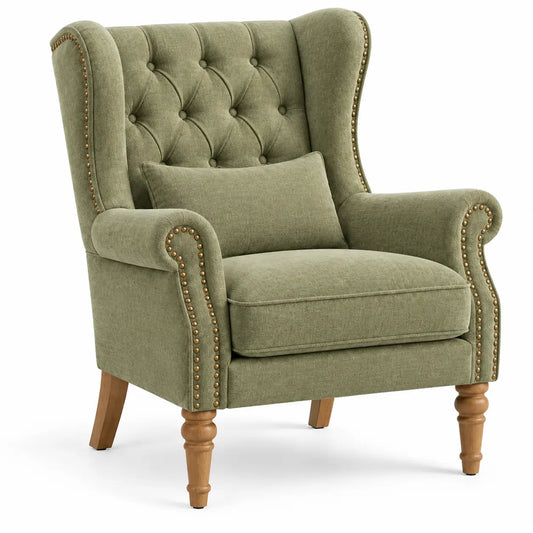 Fauteuil à oreilles capitonné et bordures cloutées, vert